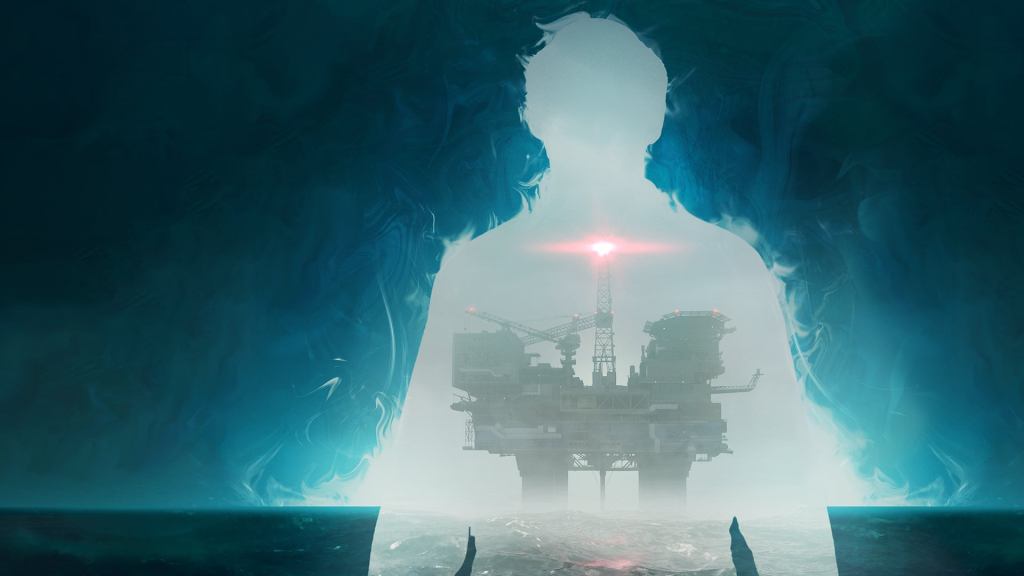 A huge oil rig is visible through the silhouette of a man